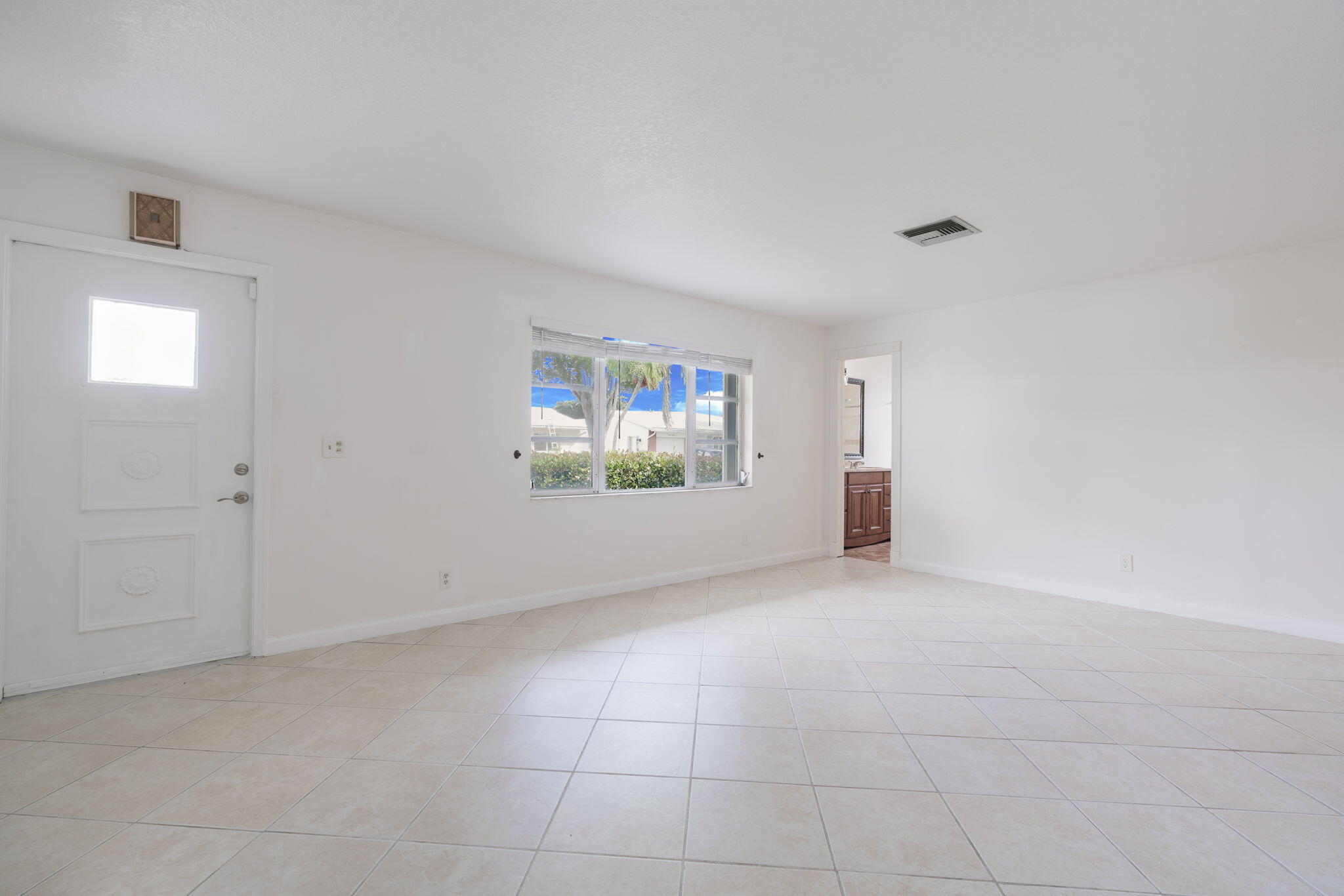 1141 Northwest 90th Way Plantation, FL 33322 - Photo 10 of 75 a view of an empty room with a window