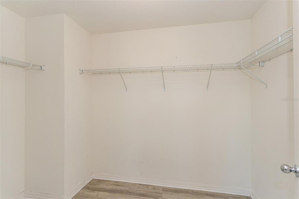 2470 Valhalla Drive Tavares, FL 32778 - Photo 16 of 26 a view of a room with racks on the wall