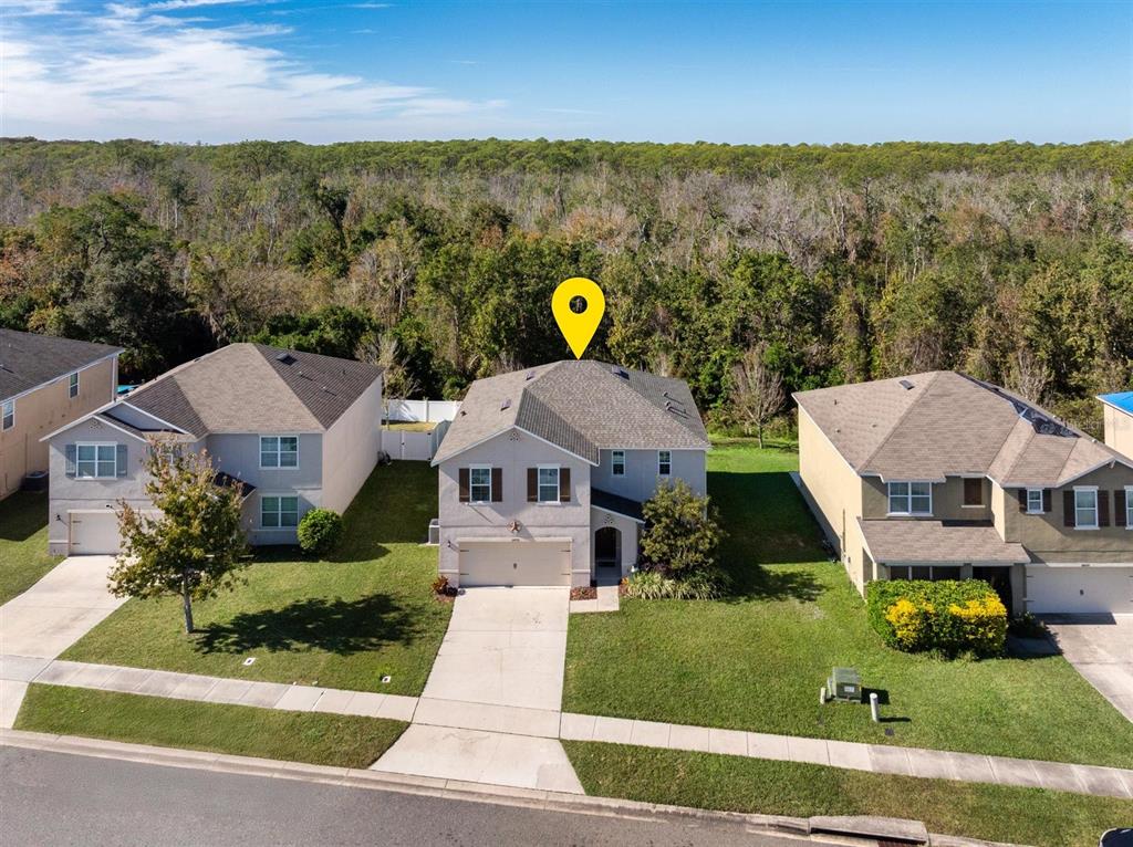 2470 Valhalla Drive Tavares, FL 32778 - Photo 2 of 26 an aerial view of a house with yard swimming pool and outdoor seating
