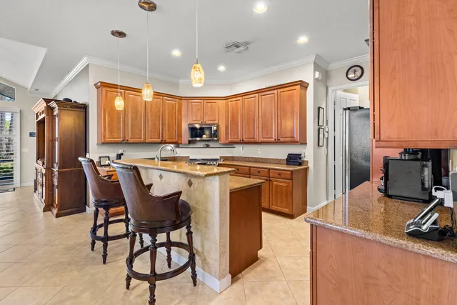 a view of a swimming pool and lounge chairs