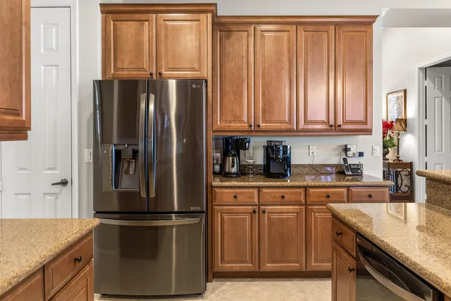 a view of a dining room with furniture large windows and wooden floor
