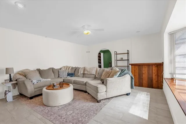 a bed room with a bed and a window