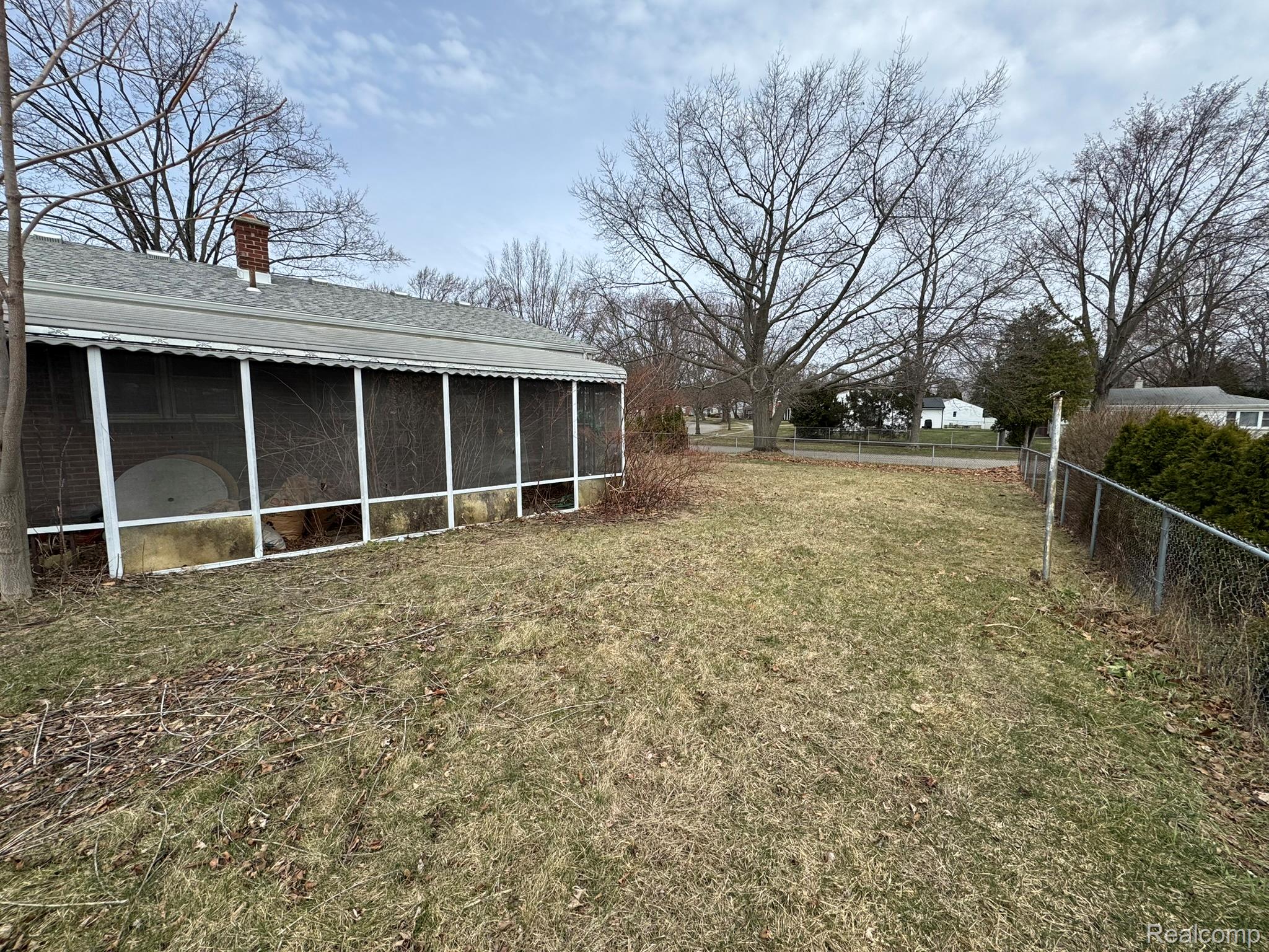 47166 Roland Street Utica, MI 48317 - Photo 8 of 18 View of yard featuring a sunroom