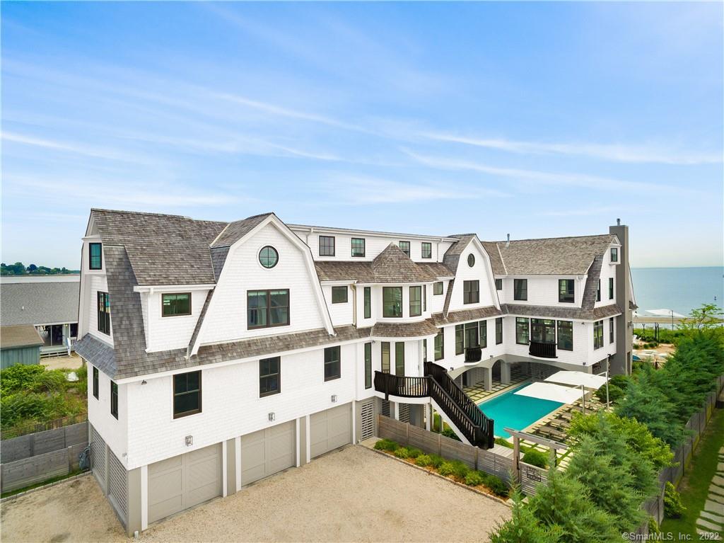 433 Fairfield Beach Road Fairfield, CT 06824 - Photo 1 of 1 an aerial view of a house with a yard