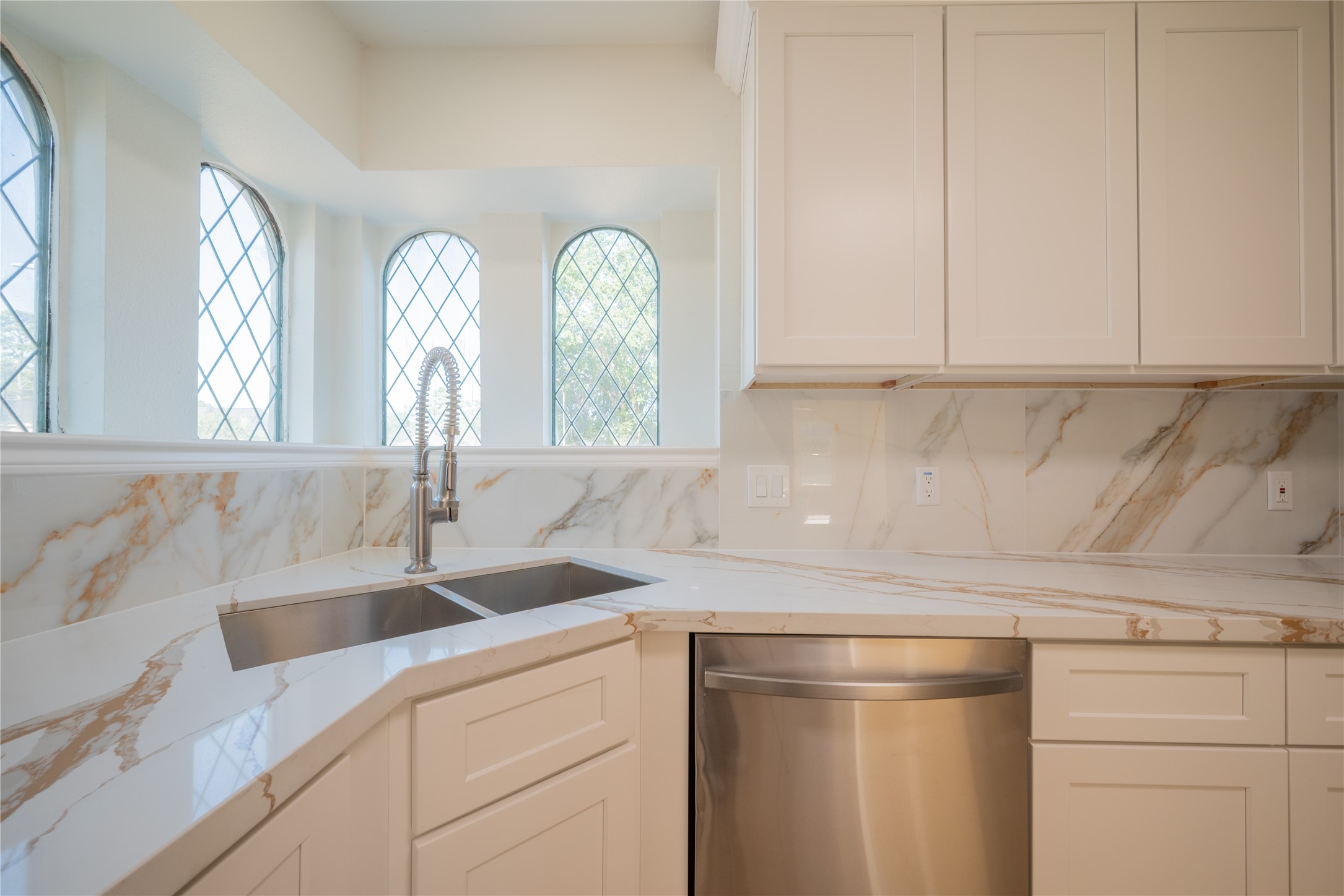 1923 Big Horn Drive Houston, TX 77090 - Photo 11 of 48 a kitchen with a sink and cabinets