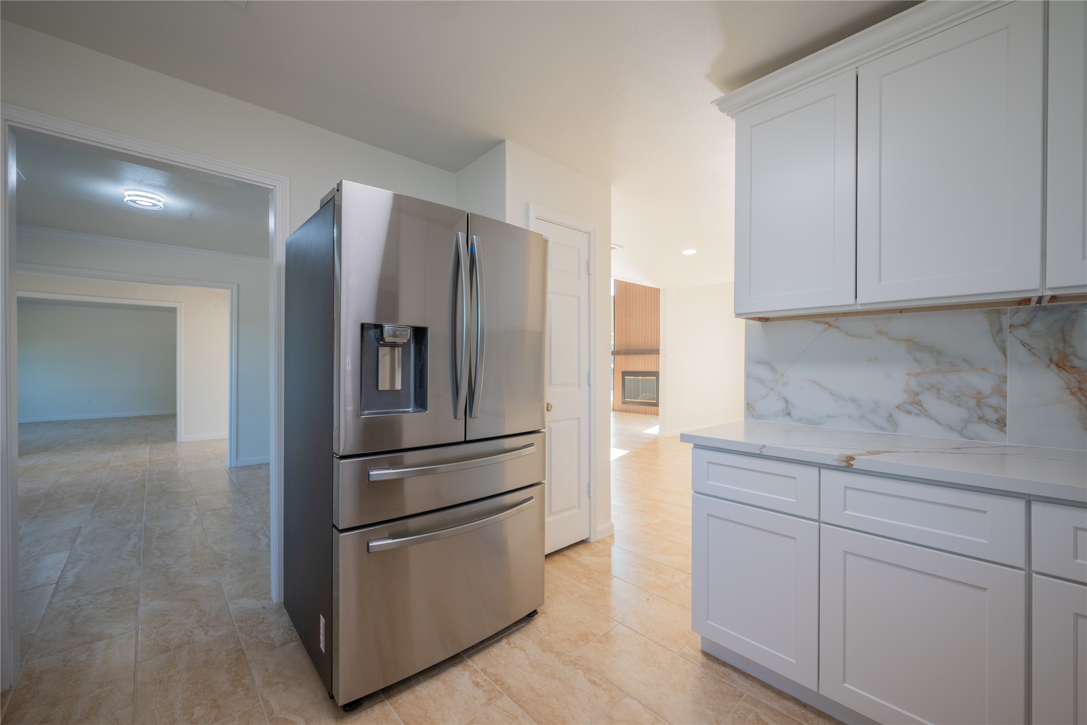 1923 Big Horn Drive Houston, TX 77090 - Photo 14 of 48 a kitchen with cabinets and stainless steel appliances