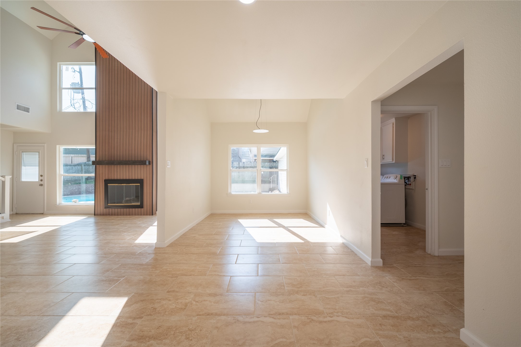 1923 Big Horn Drive Houston, TX 77090 - Photo 16 of 48 a view of an empty room with wooden floor and a window