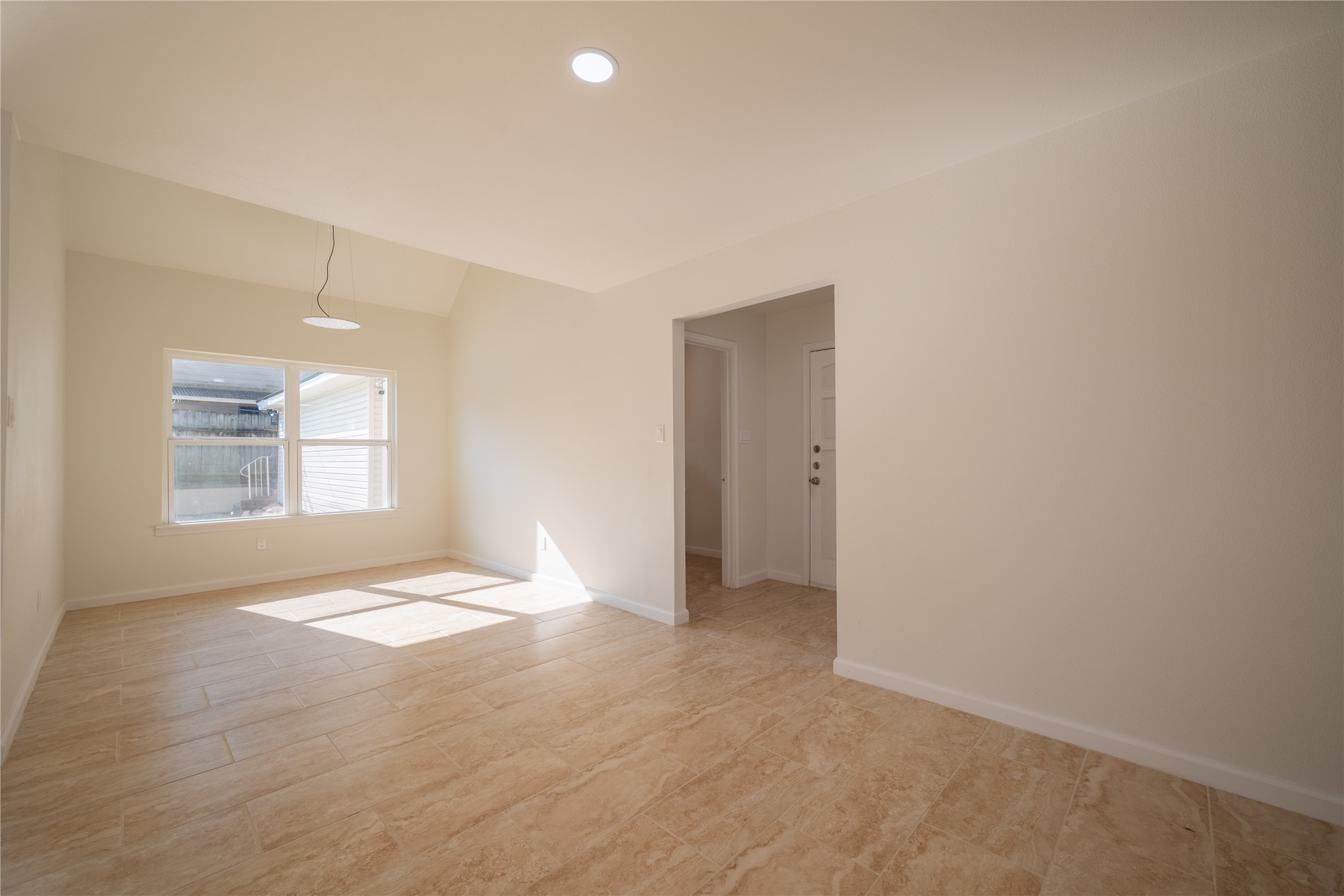 1923 Big Horn Drive Houston, TX 77090 - Photo 17 of 48 a view of an empty room with a window