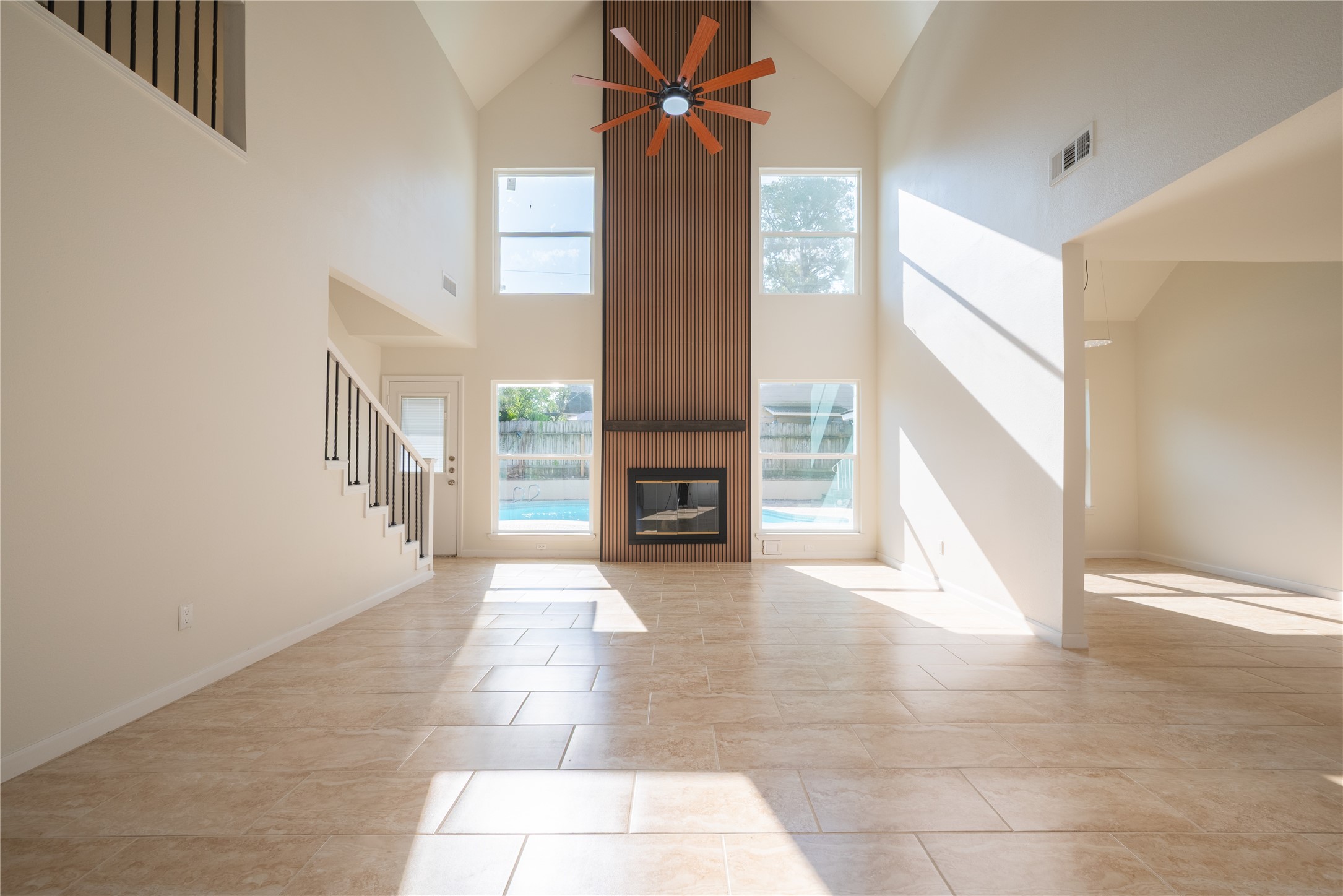 1923 Big Horn Drive Houston, TX 77090 - Photo 21 of 48 a view of a livingroom with an empty space and a fireplace