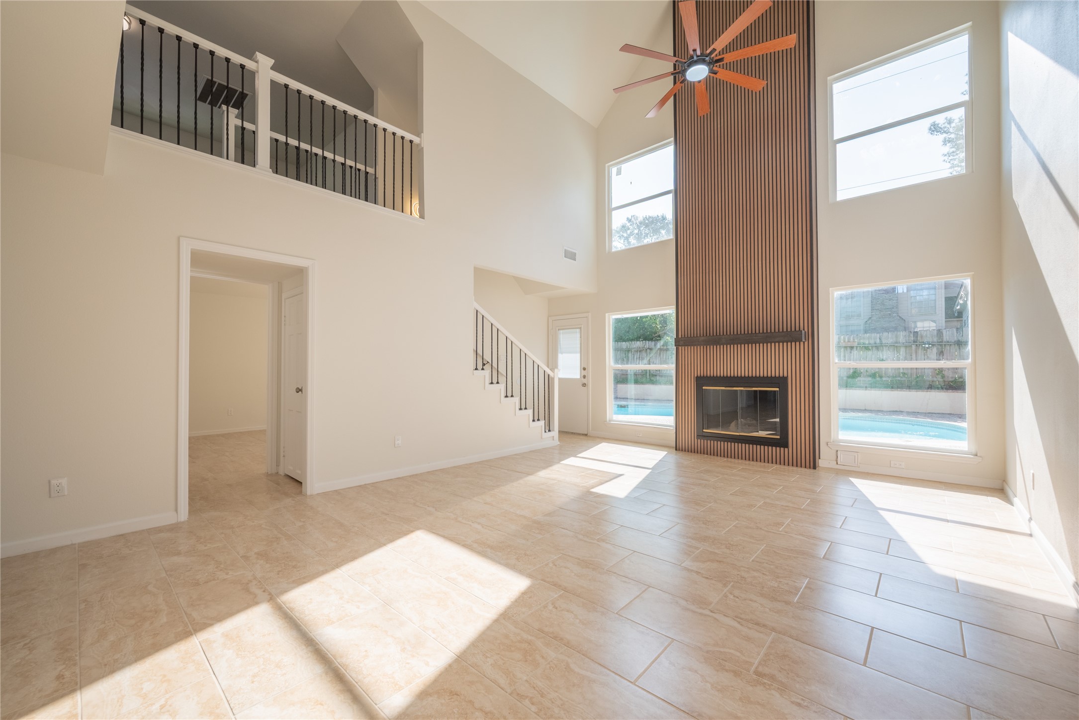 1923 Big Horn Drive Houston, TX 77090 - Photo 22 of 48 a view of a livingroom with an empty space and a fireplace
