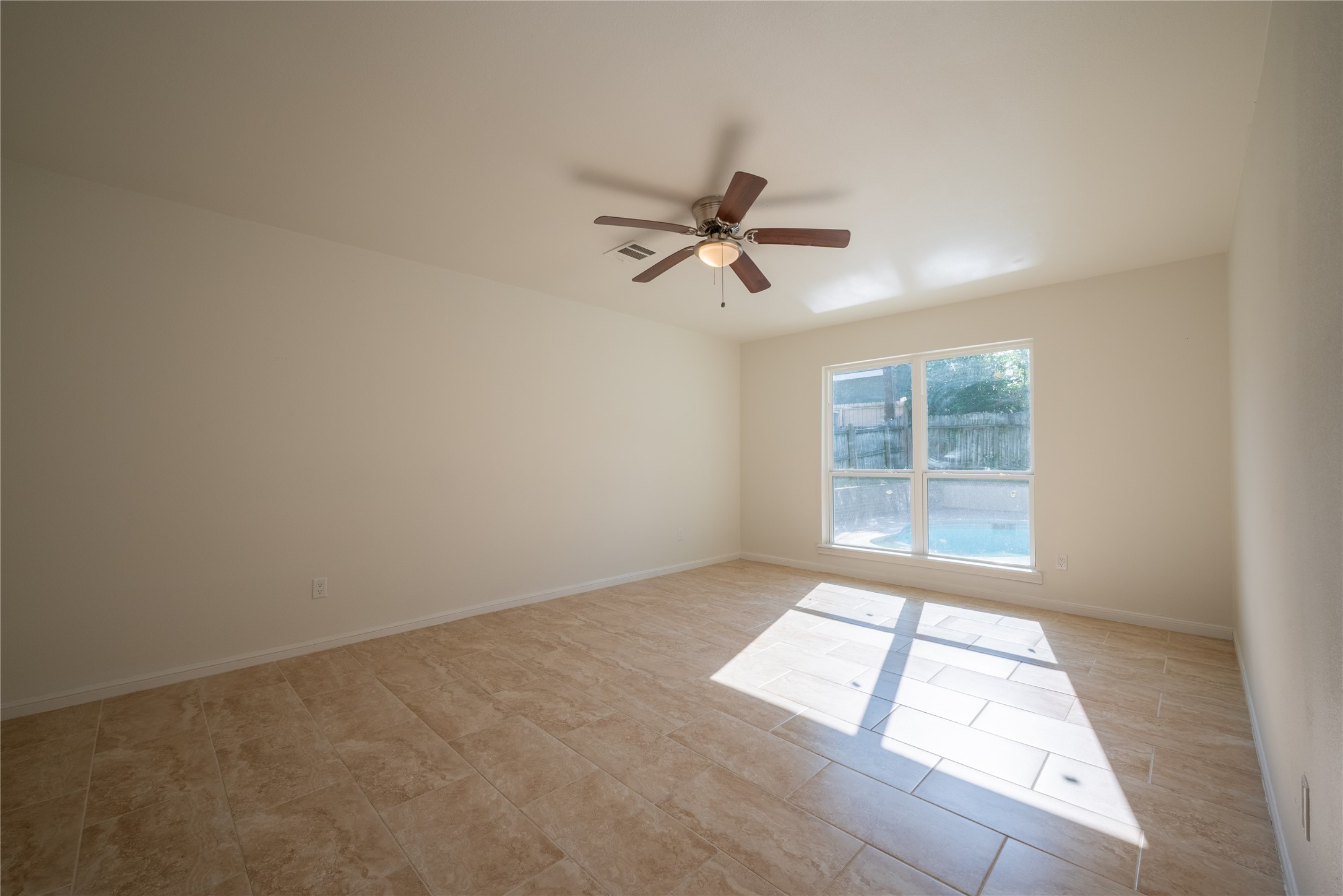 1923 Big Horn Drive Houston, TX 77090 - Photo 26 of 48 an empty room with a window