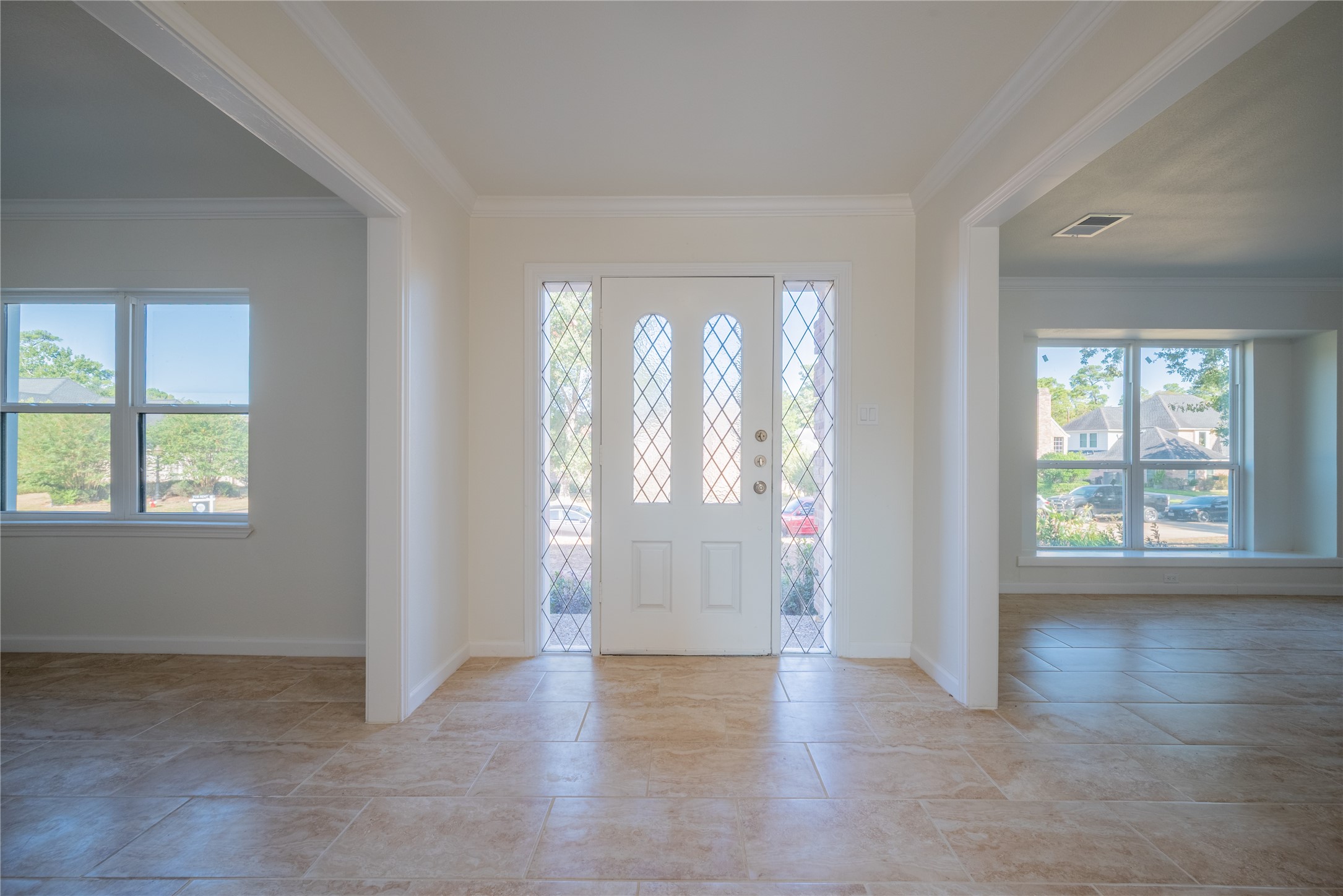 1923 Big Horn Drive Houston, TX 77090 - Photo 4 of 48 wooden floor in an empty room with a window