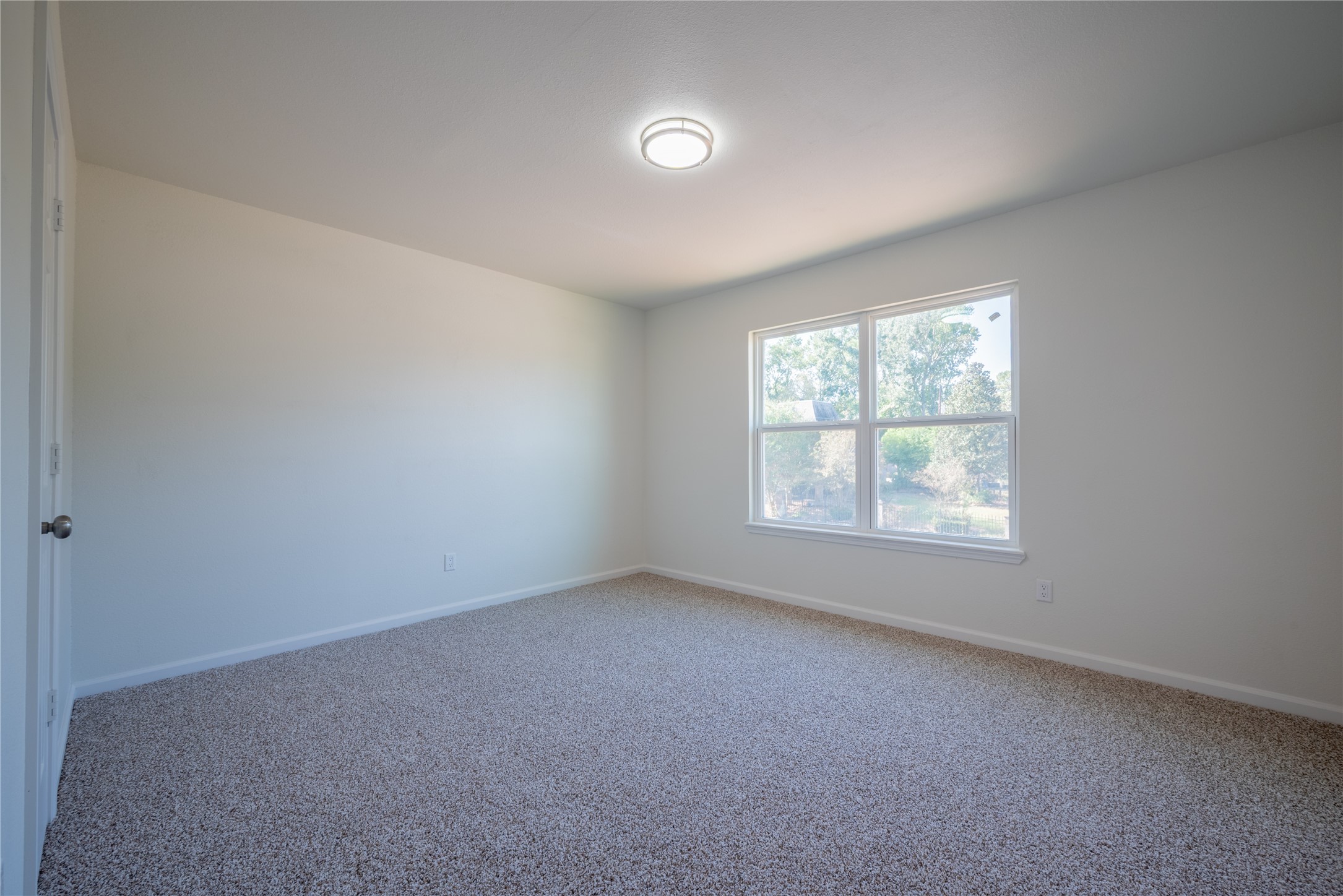 1923 Big Horn Drive Houston, TX 77090 - Photo 42 of 48 an empty room with a window