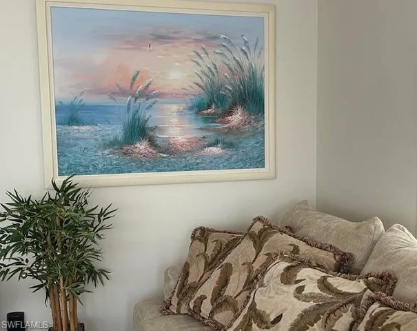 a view of a bed in a bedroom