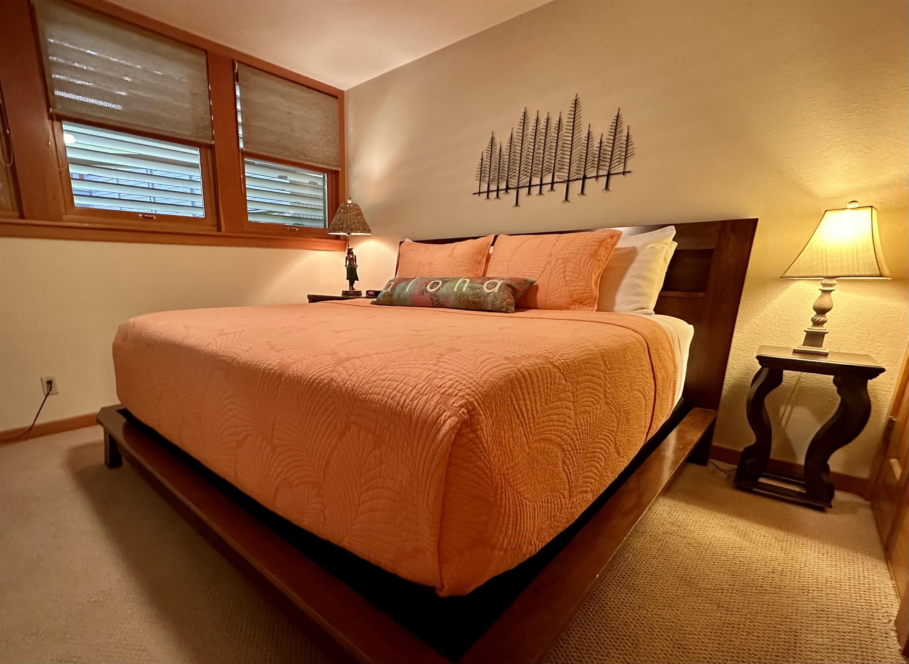 2994 South Kihei Road, Unit 203 Kihei, HI 96753 - Photo 15 of 28 a bed sitting in a bedroom next to a window