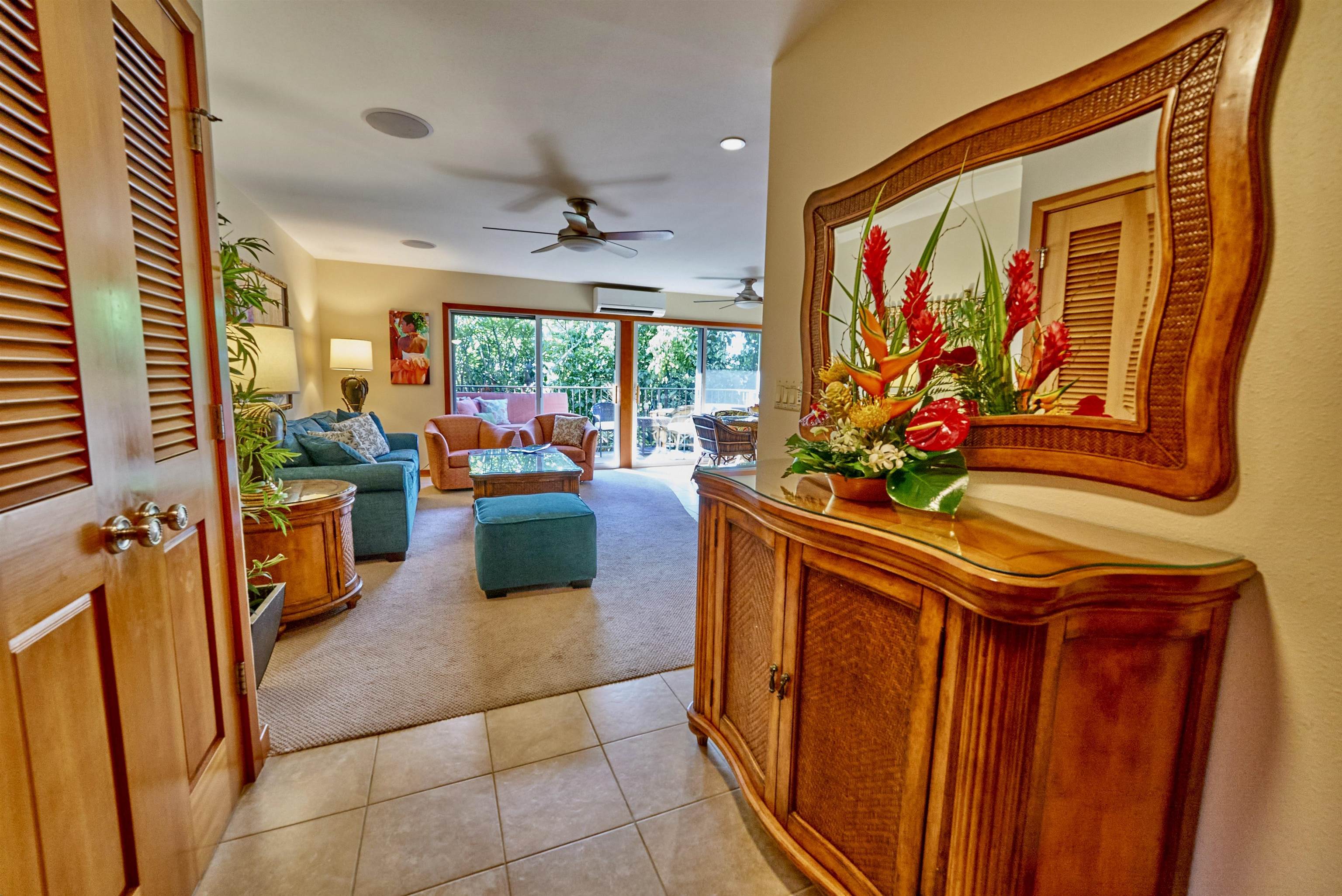 2994 South Kihei Road, Unit 203 Kihei, HI 96753 - Photo 2 of 28 a kitchen with stainless steel appliances kitchen island granite countertop a refrigerator and a stove