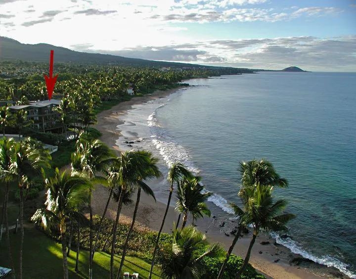 2994 South Kihei Road, Unit 203 Kihei, HI 96753 - Photo 27 of 28 a view of a lake with a floor to ceiling window