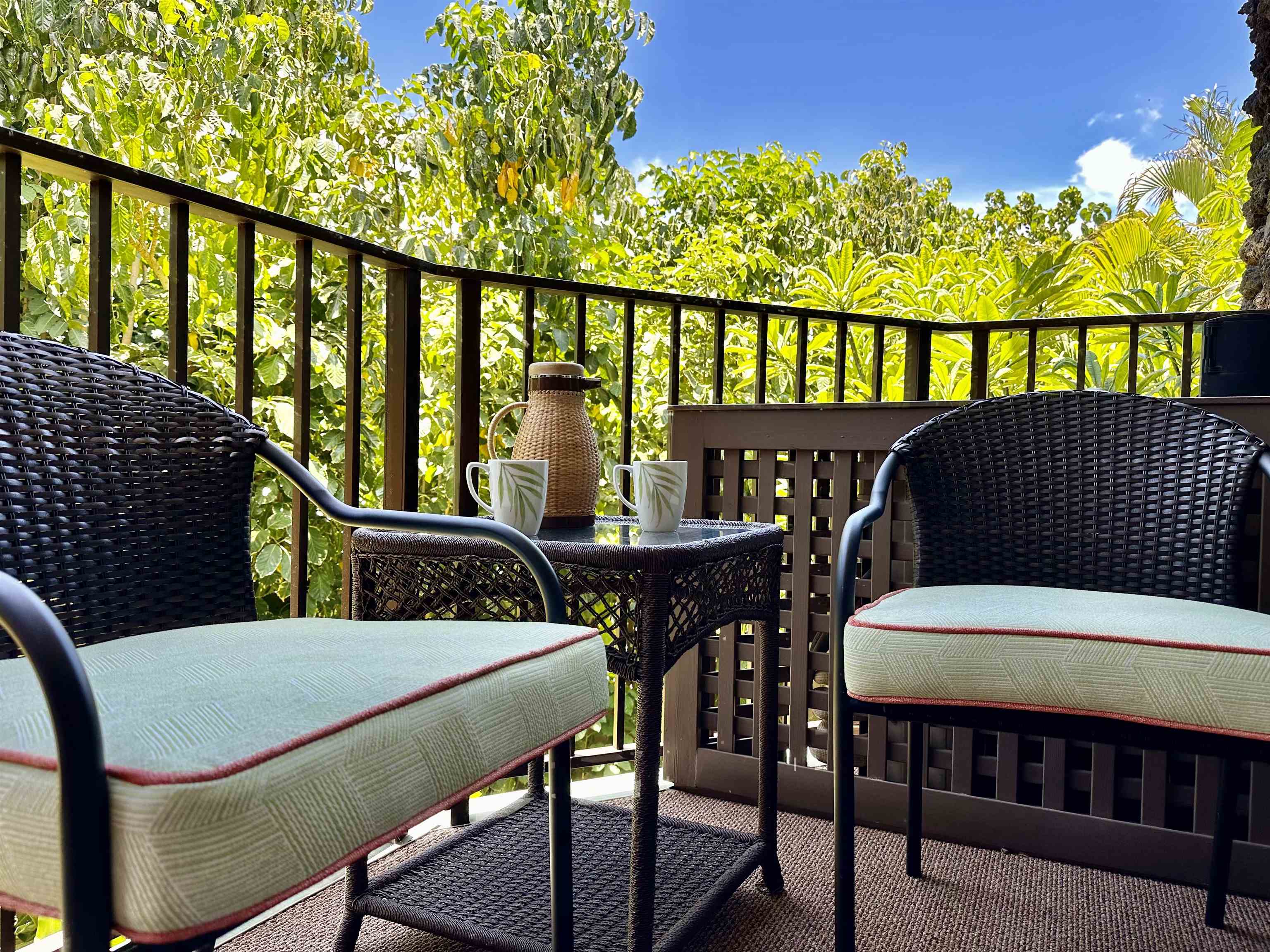 2994 South Kihei Road, Unit 203 Kihei, HI 96753 - Photo 6 of 28 a view of a chairs and table in the balcony