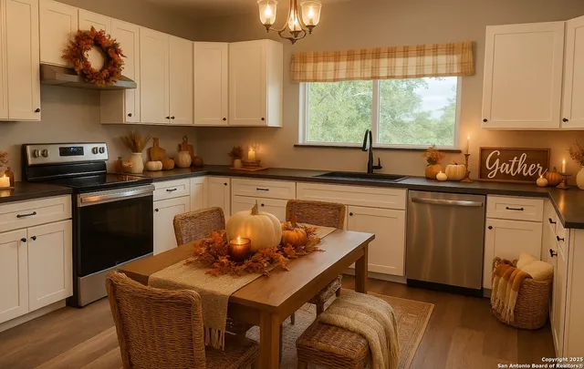 a kitchen with stainless steel appliances granite countertop a sink a stove and a refrigerator