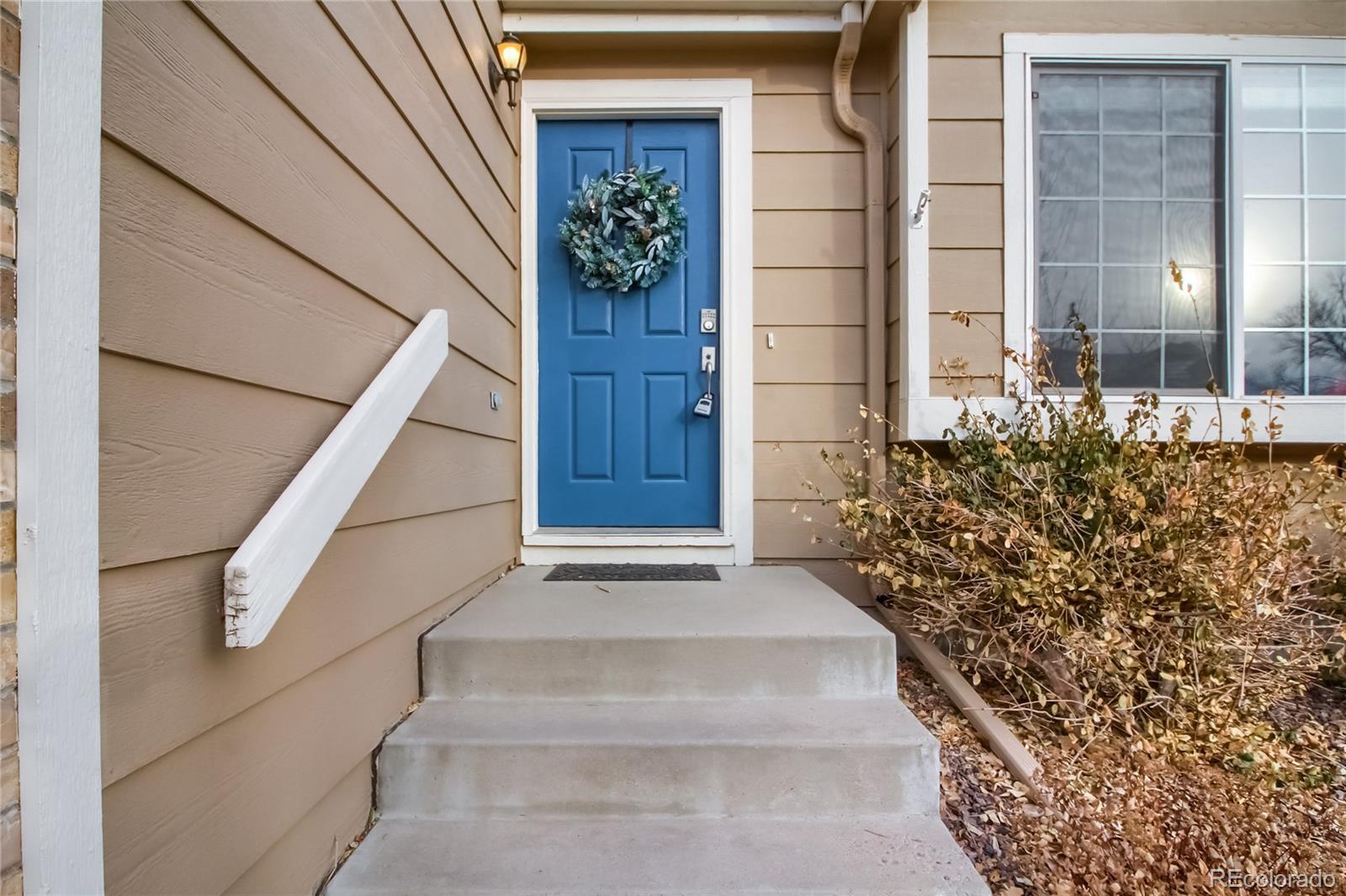 1031 Timbervale Trail Highlands Ranch, CO 80129 - Photo 2 of 34 a house with a outdoor space