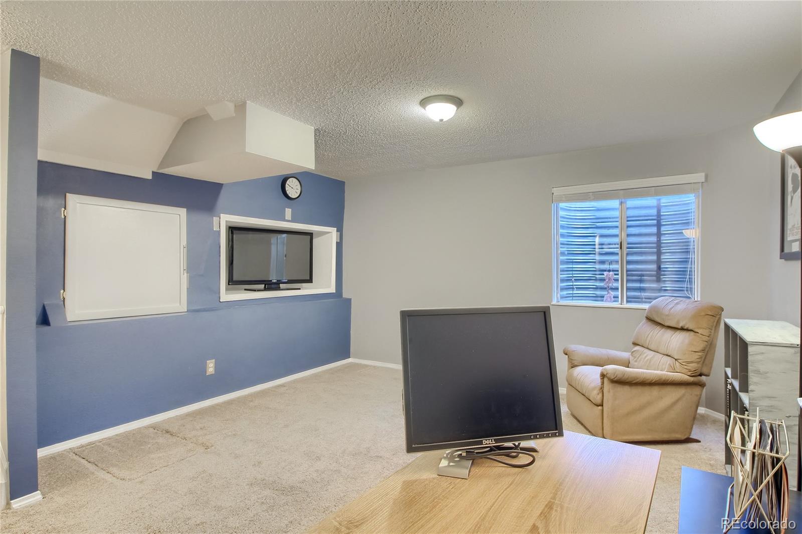 1031 Timbervale Trail Highlands Ranch, CO 80129 - Photo 24 of 34 a view of workspace with furniture and window