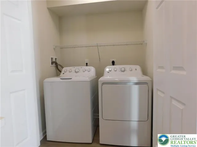 a utility room with dryer and washer