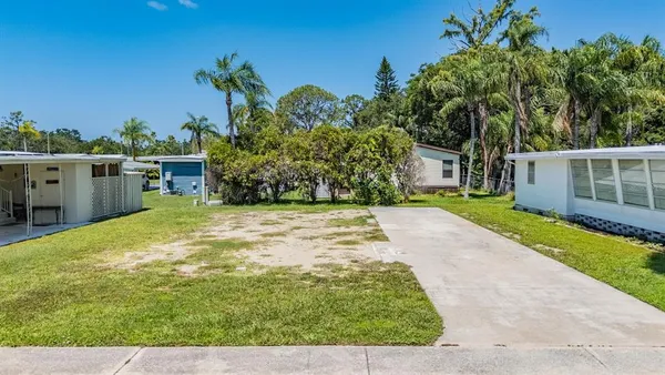 a view of a backyard with a garden