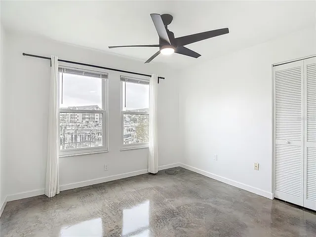 an aerial view of a house with swimming pool garden and mountain view