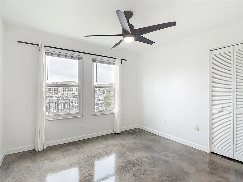 5722 Biscayne Court, Unit 103 New Port Richey, FL 34652 - Photo 28 of 99 a view of an empty room with a window