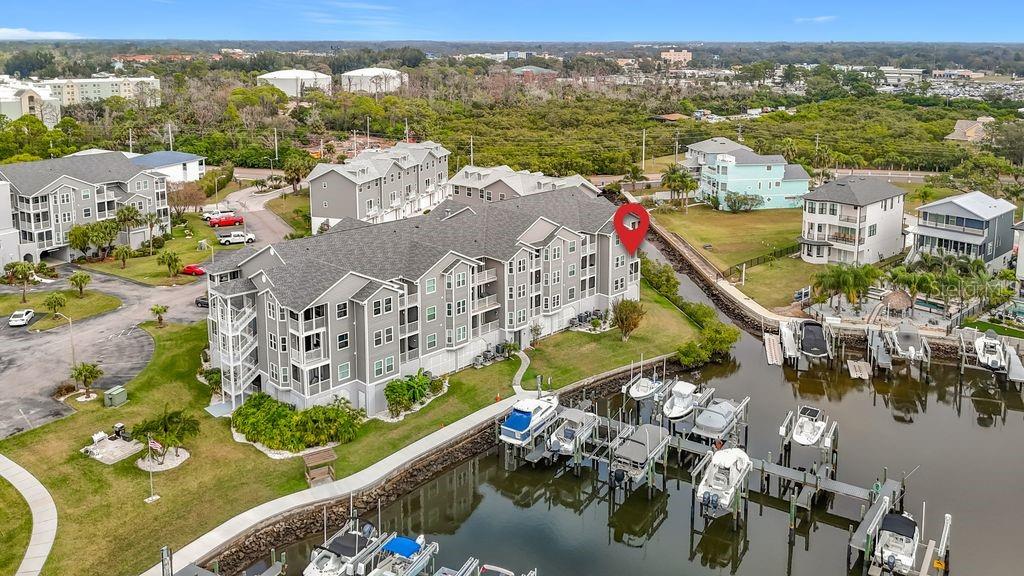 5722 Biscayne Court, Unit 103 New Port Richey, FL 34652 - Photo 3 of 99 an aerial view of residential houses with outdoor space