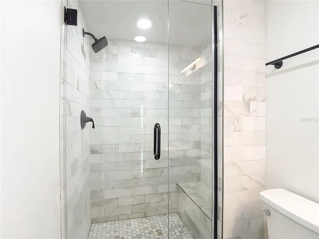 a dining room with furniture water view and pool table