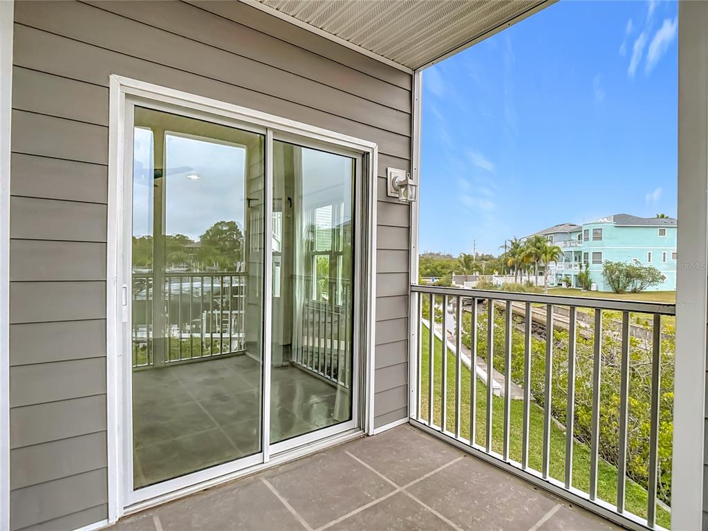 5722 Biscayne Court, Unit 103 New Port Richey, FL 34652 - Photo 37 of 99 a view of a balcony
