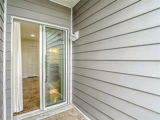 a view of a swimming pool with a lounge chairs