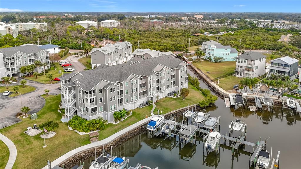 5722 Biscayne Court, Unit 103 New Port Richey, FL 34652 - Photo 46 of 99 an aerial view of residential houses with outdoor space