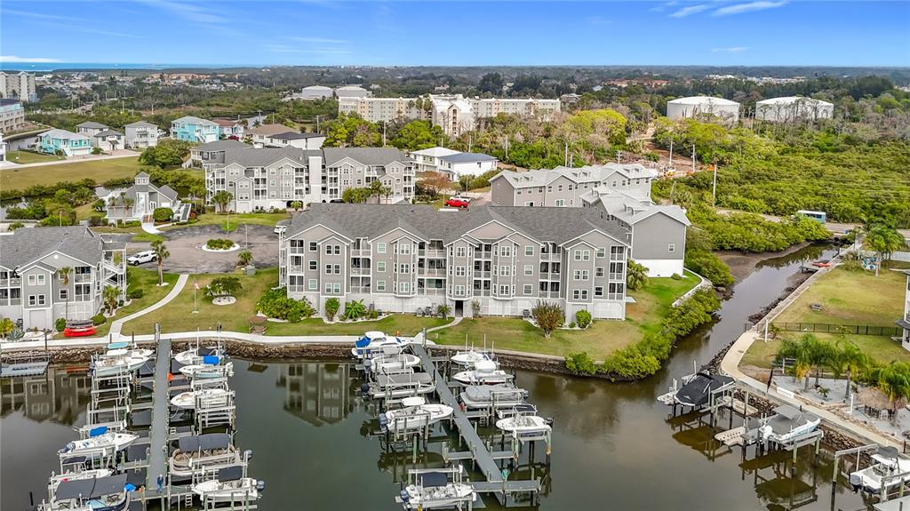 5722 Biscayne Court, Unit 103 New Port Richey, FL 34652 - Photo 47 of 99 an aerial view of residential building with outdoor space