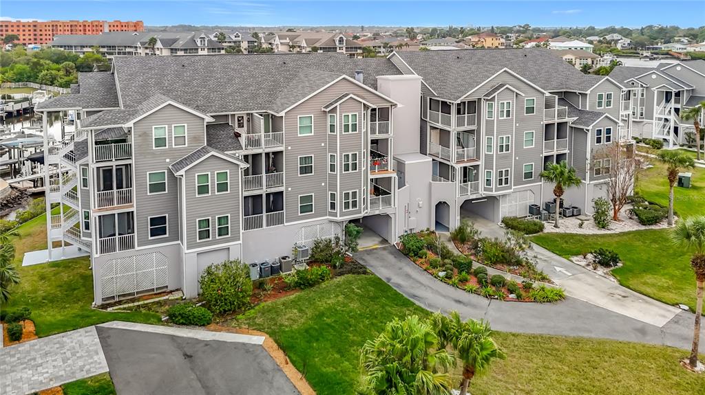 5722 Biscayne Court, Unit 103 New Port Richey, FL 34652 - Photo 5 of 99 an aerial view of multiple houses
