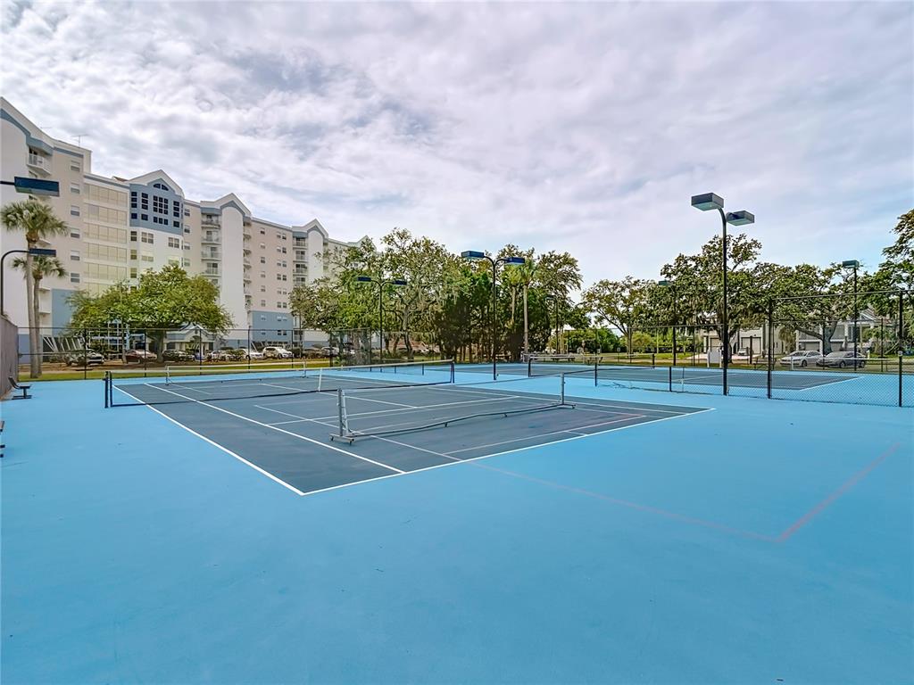 5722 Biscayne Court, Unit 103 New Port Richey, FL 34652 - Photo 83 of 99 a view of a tennis court