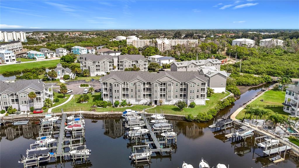 5722 Biscayne Court, Unit 103 New Port Richey, FL 34652 - Photo 87 of 99 a view of a city with lawn chairs