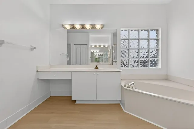 a view of a hallway with washer and dryer