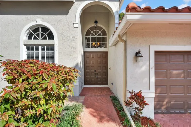 a view of entryway with workspace and stairs