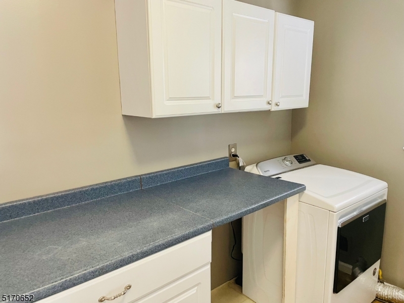 57 Russell Avenue Rahway, NJ 07065 - Photo 19 of 20 a utility room with dryer and washer