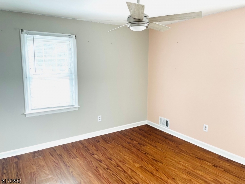 57 Russell Avenue Rahway, NJ 07065 - Photo 10 of 20 an empty room with a window