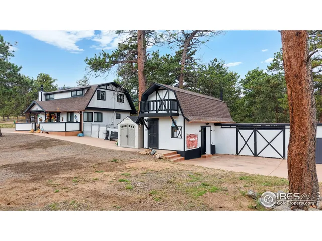 a aerial view of a house with a garden