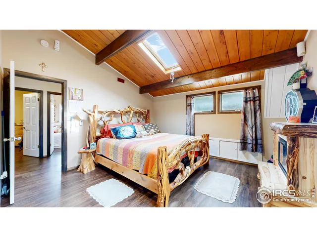 a bathroom with a toilet and shower