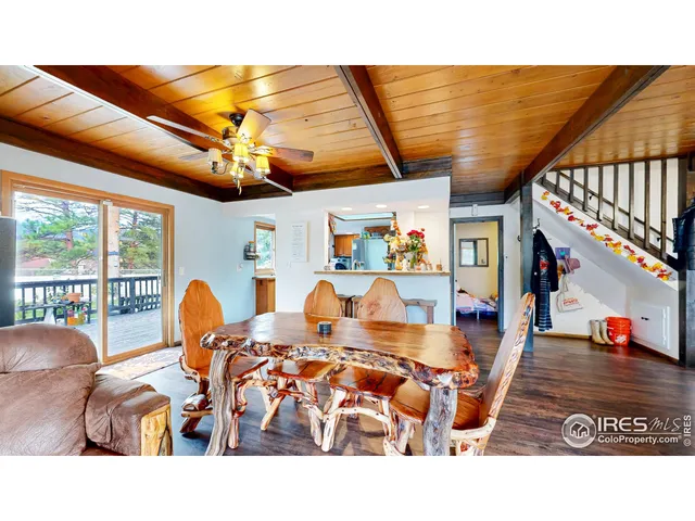 a kitchen with stainless steel appliances a stove a sink and a refrigerator