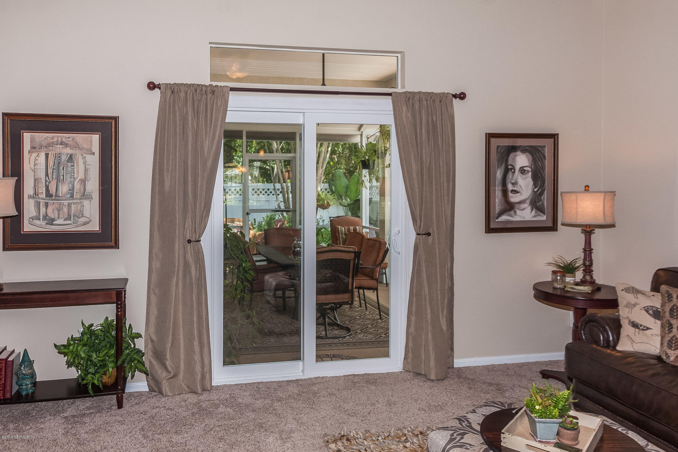 1769 Keswick Road St. Augustine, FL 32084 - Photo 18 of 31 a view of a livingroom with furniture and a window