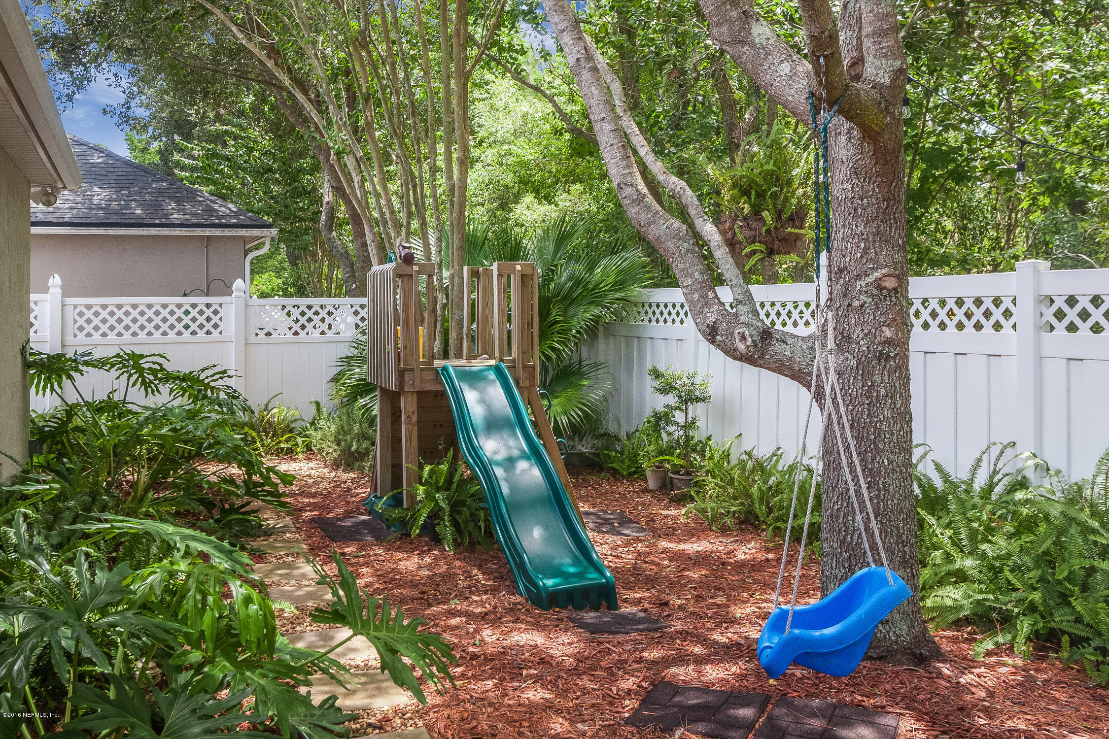 1769 Keswick Road St. Augustine, FL 32084 - Photo 3 of 31 a view of a garden with plants