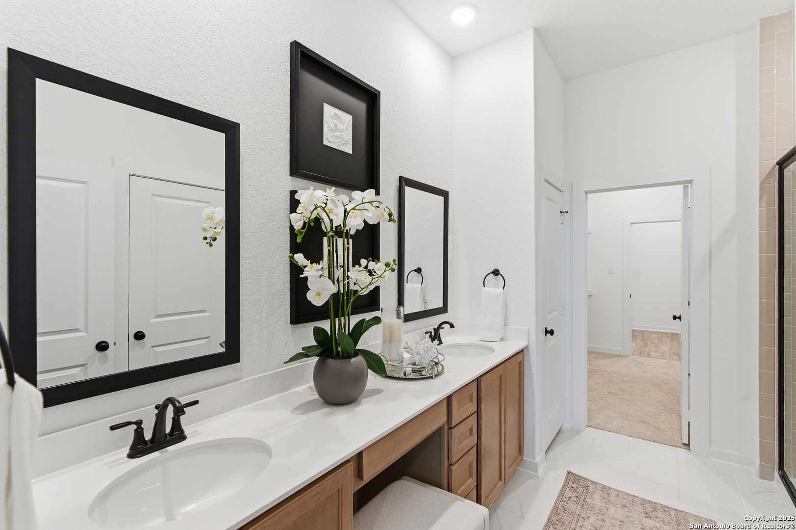 9426 Chatside Schertz, TX 78154 - Photo 13 of 44 a bathroom with sink and mirror
