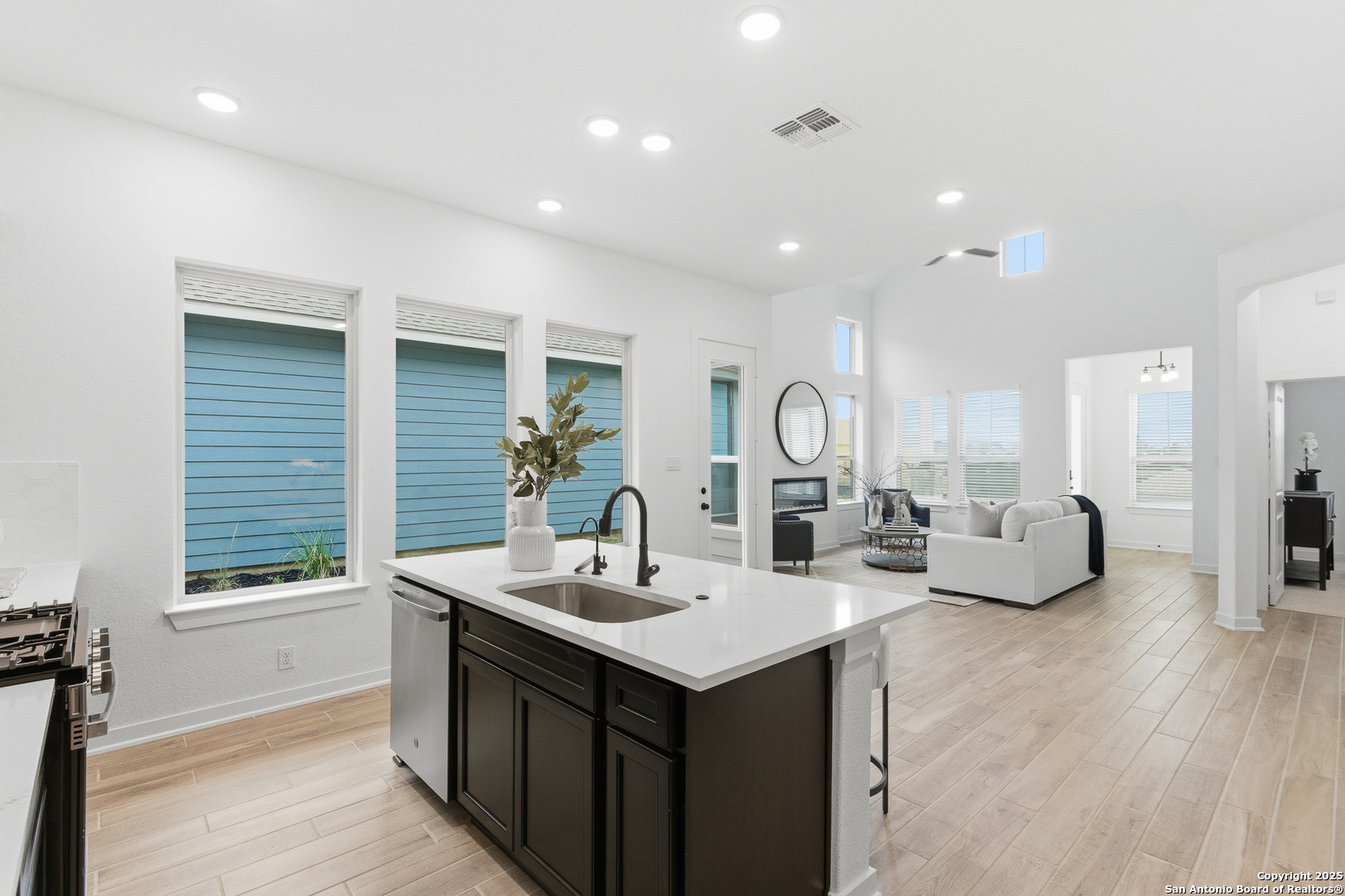 9426 Chatside Schertz, TX 78154 - Photo 24 of 44 a kitchen with sink refrigerator and window