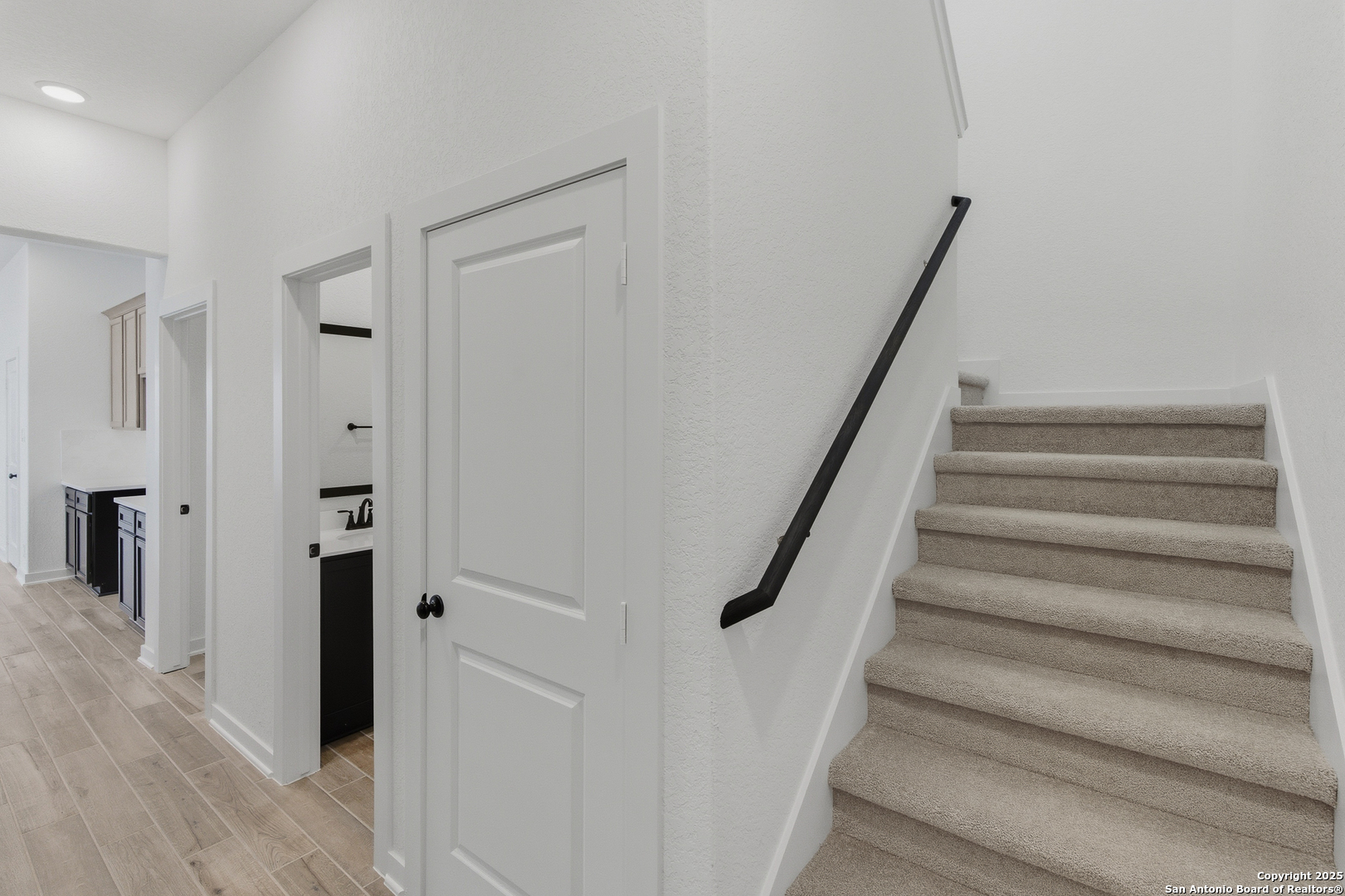 9426 Chatside Schertz, TX 78154 - Photo 28 of 44 a view of staircase with white walls and white walls
